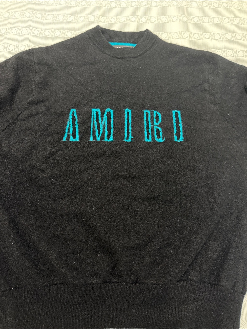 AMIRI Black Crewneck Sweater with Teal Embroidered Logo